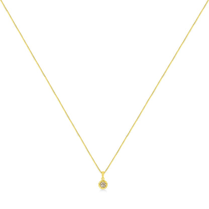 Front view of a yellow metal necklace with a small pendant featuring one round brownish gemstone in a four-prong setting on a white background.