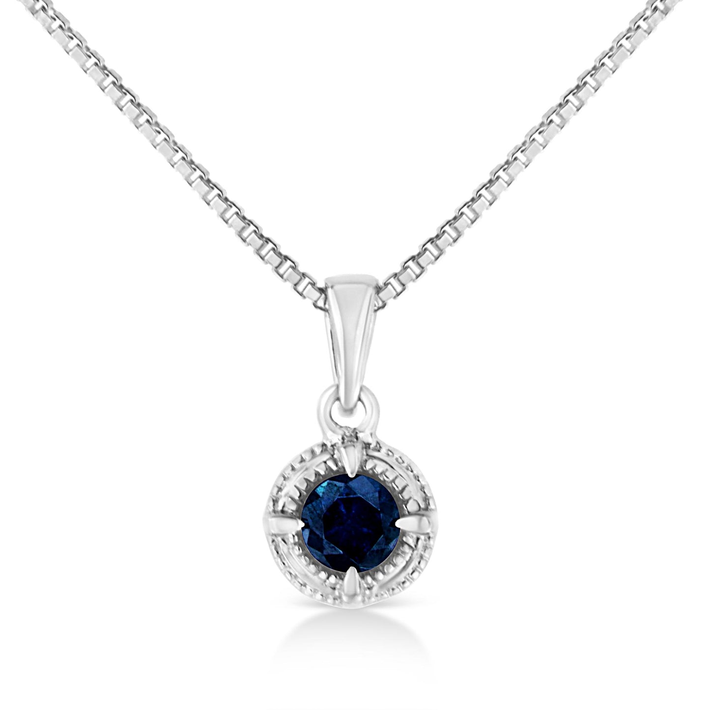 Front view of a white metal necklace with a round blue gemstone in a four-prong setting pendant.