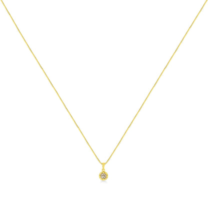 Front view of yellow necklace with single brownish round gemstone in four-prong setting pendant.