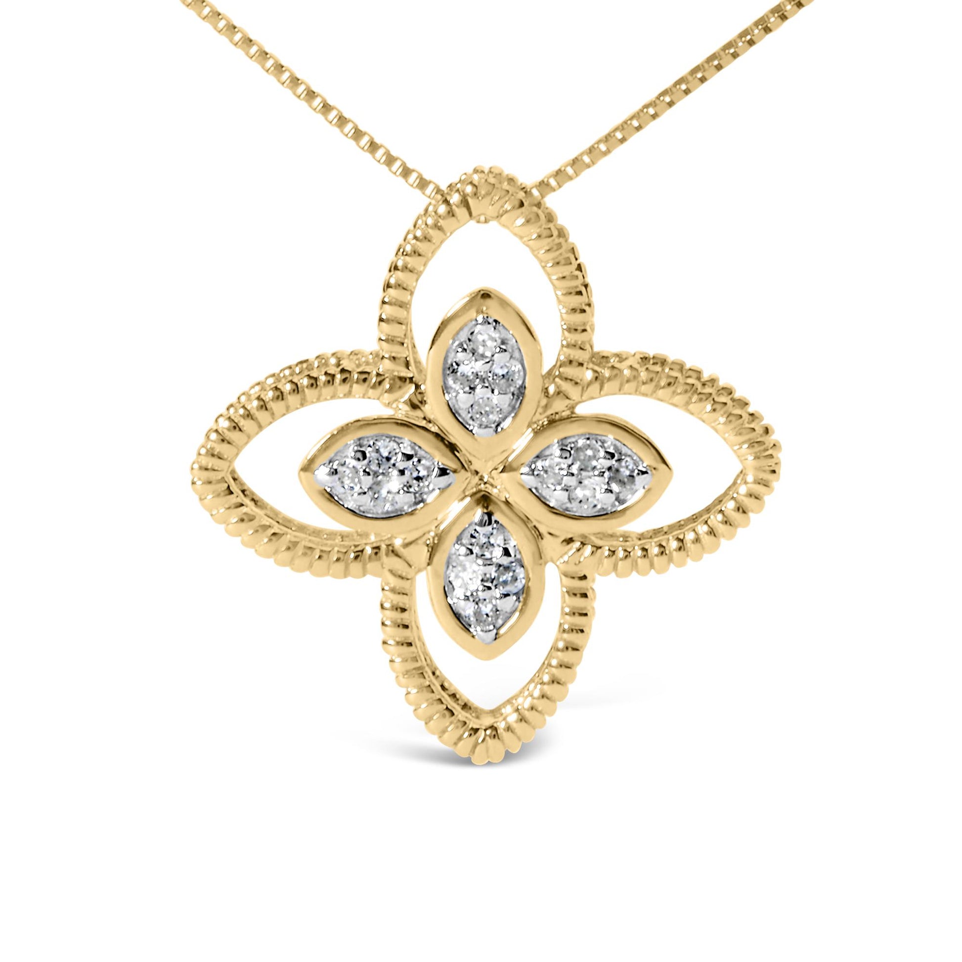 Front-facing shot of a yellow metal necklace featuring a flower-shaped pendant with textured petals and four marquise-shaped clusters of white gemstones in prong settings.