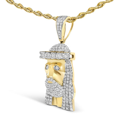 Close-up front view of a yellow necklace chain with a pendant shaped like a face adorned with white gemstones in a pave setting.
