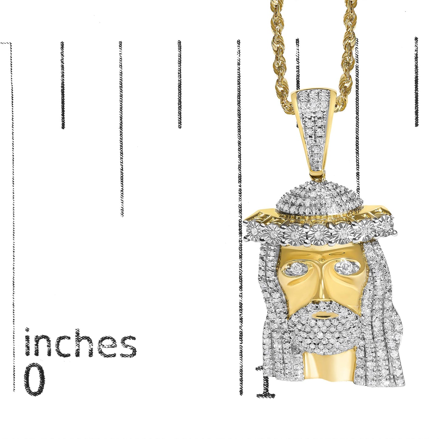 Close-up front view of a yellow necklace with a face-shaped pendant adorned with white gemstones in a pave setting, shown on a measurement scale.