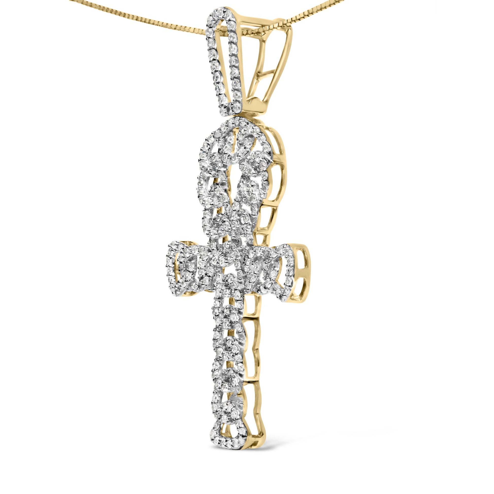 Close-up front angle of a yellow metal cross-shaped necklace pendant adorned with round white gemstones in prong settings.