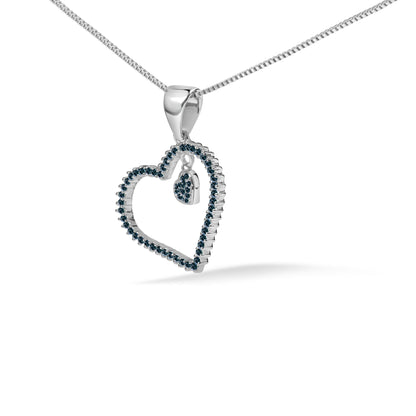 Close-up front angle of a white metal necklace with a heart-shaped pendant outlined with round blue gemstones in prong settings, shown on a white background.