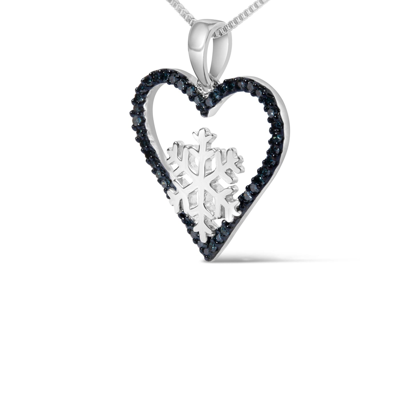 Close-up front angle of a white metal heart-shaped necklace pendant with blue round prong-set gemstones outlining the heart and a snowflake design inside, displayed on a white background.