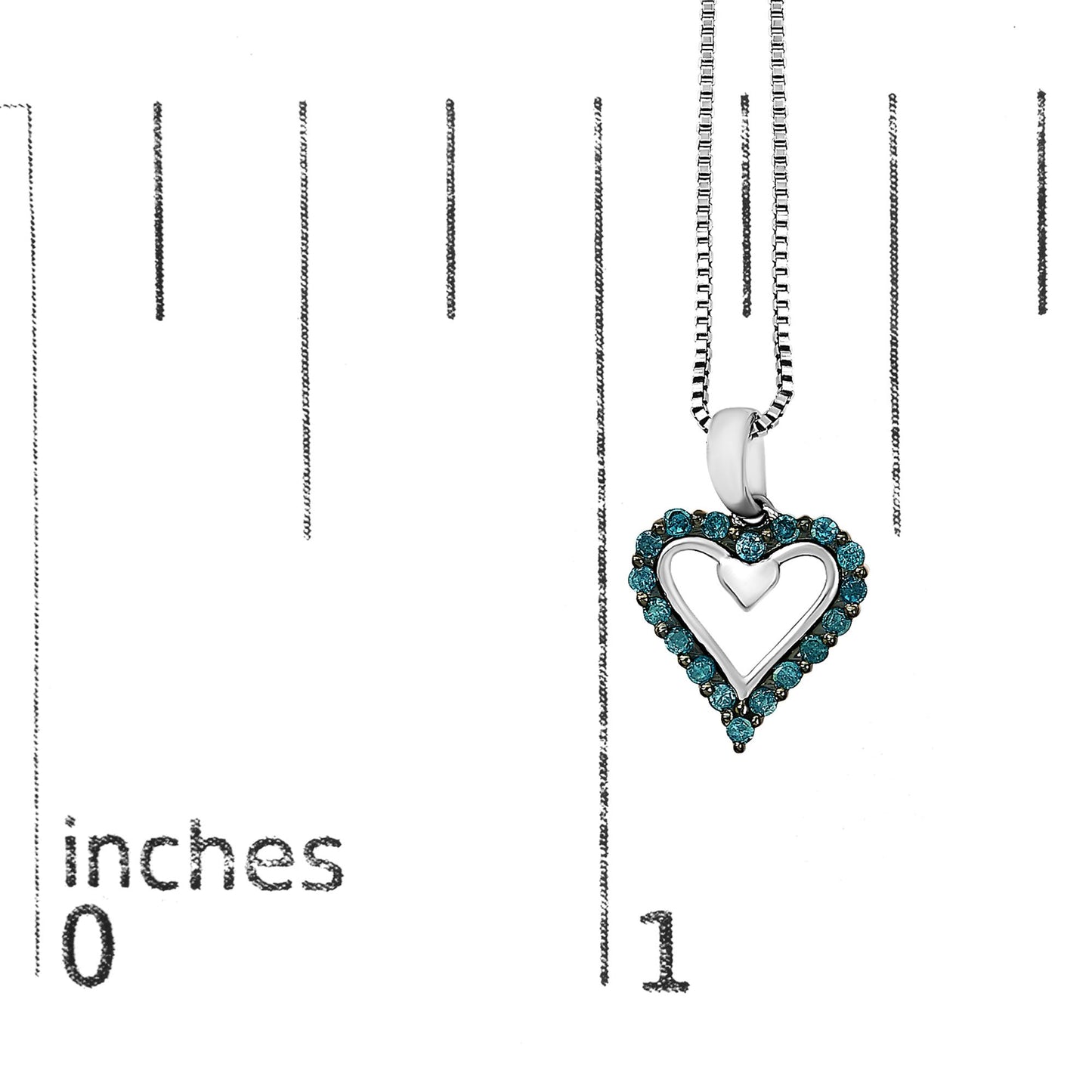 White metal necklace with heart-shaped pendant bordered by round blue gemstones, displayed hanging against a ruler for size reference, front-facing angle.