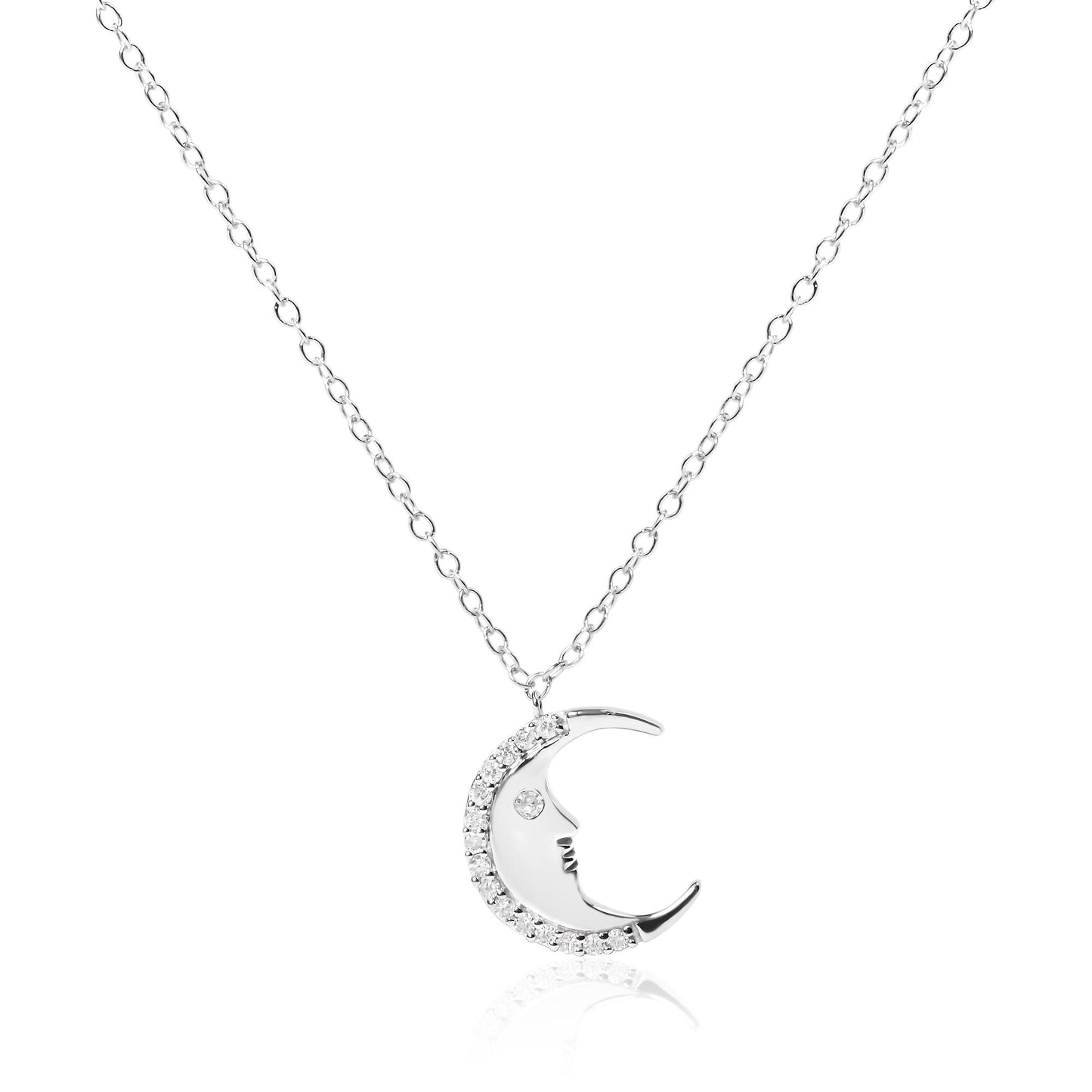 Front-facing view of a white metal crescent moon necklace pendant with round white gemstones set along the outer edge and one gemstone representing the eye.
