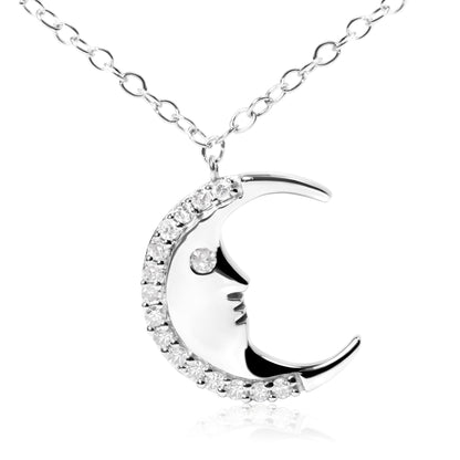 Close-up front view of a white metal crescent moon-shaped necklace pendant adorned with round white gemstones along the outer edge and one gemstone set as an eye, hanging from a chain.