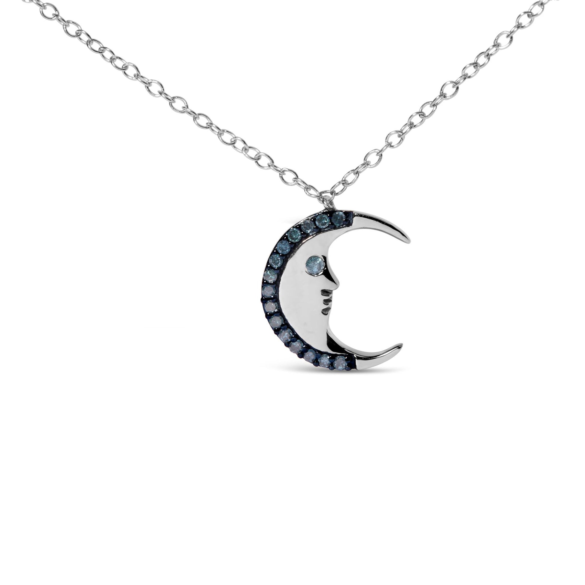 Front angle of a white metal crescent moon necklace pendant with a face design, adorned with round blue gemstones in prong settings along the outer edge and a single blue gemstone as the eye.