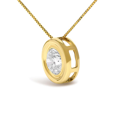 Close-up angled view of a yellow necklace with a round white gemstone in a bezel setting pendant.