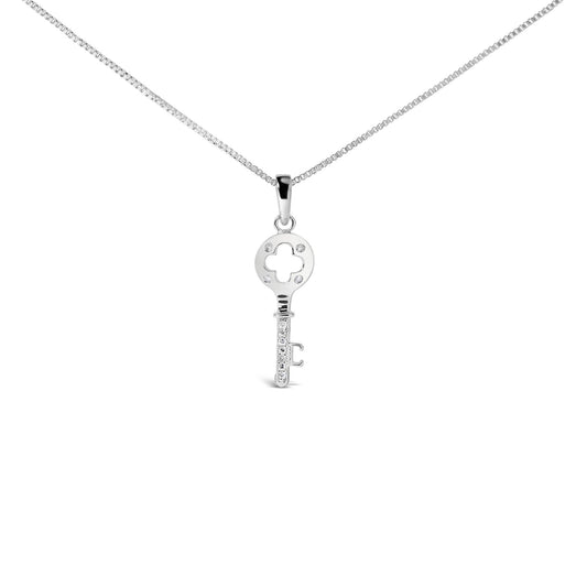 Front angle view of a white metal key-shaped necklace pendant with round white gemstones in prong settings on the circular top and along the shaft, suspended on a box chain.