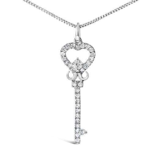 Front view of a white metal necklace with a key-shaped pendant adorned with small round white gemstones in prong settings.