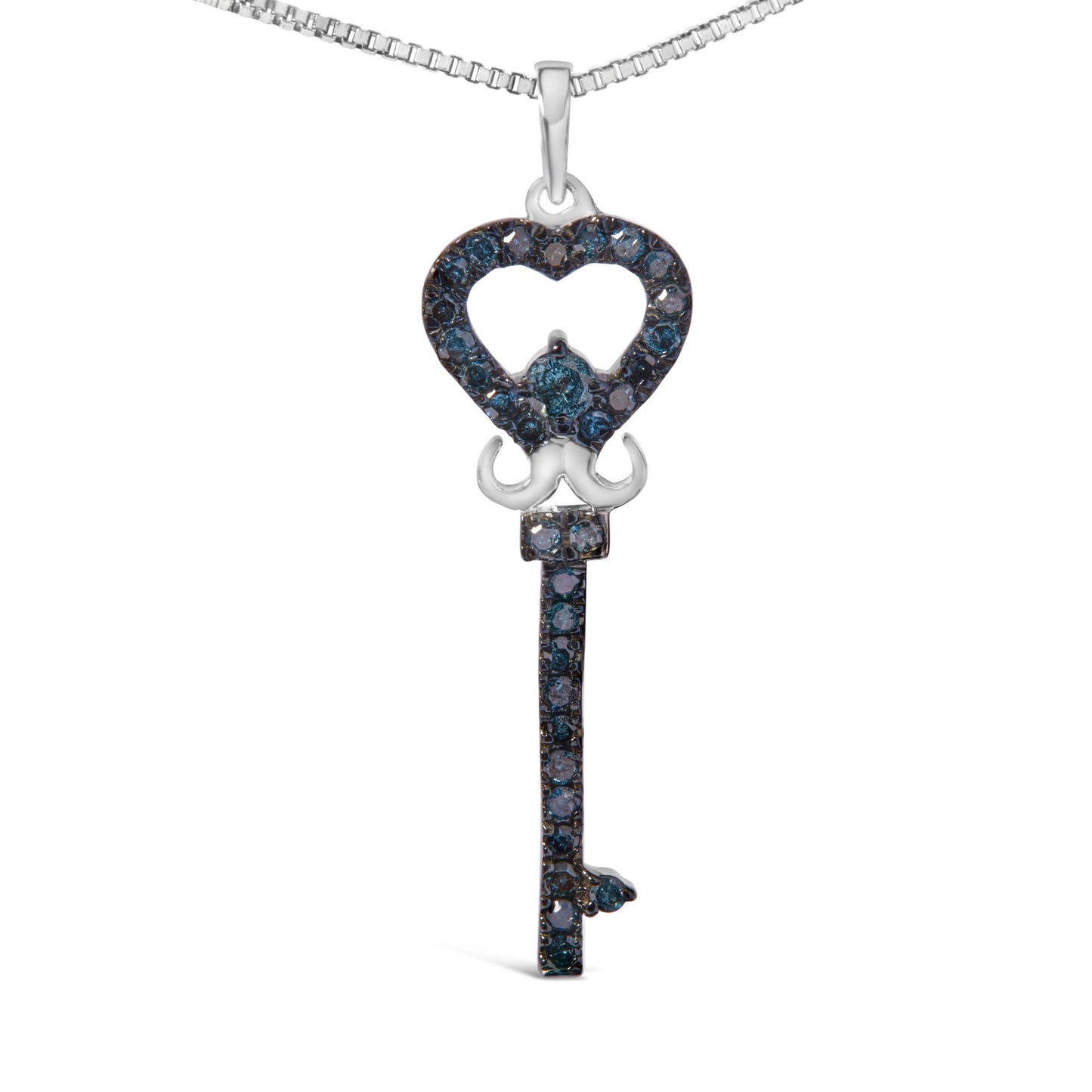 Front-facing shot of a white metal key-shaped necklace pendant adorned with round blue gemstones in prong settings, featuring a heart-shaped top and a vertical shaft below.