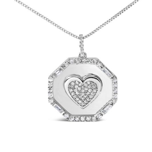 Front view of a white metal necklace with an octagonal pendant featuring a heart shape filled with small round white gemstones, surrounded by a border of alternating round and baguette white gemstones, photographed on a white background.