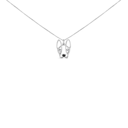 Front view of white metal necklace with dog face pendant featuring two round white gemstones as eyes in bezel settings on a thin chain.