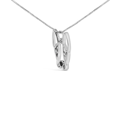 Front angled view of a white metal necklace pendant shaped like two elongated loops with round white gemstones set in bezel settings near the top of each loop.