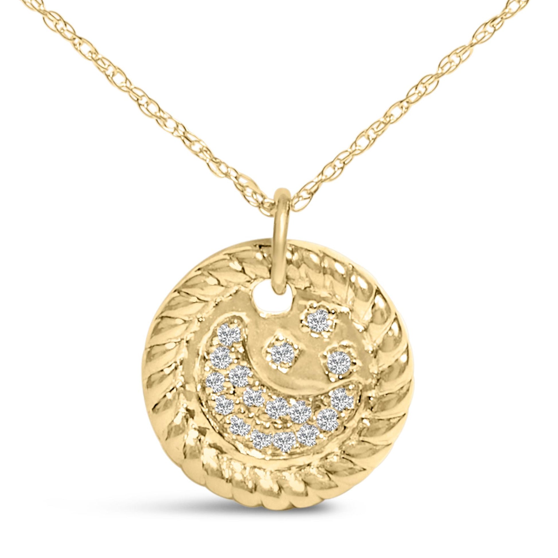 Close-up front view of a yellow metal round pendant necklace with a textured rope-like border and embedded round white gemstones in a prong setting forming a smiley face design.