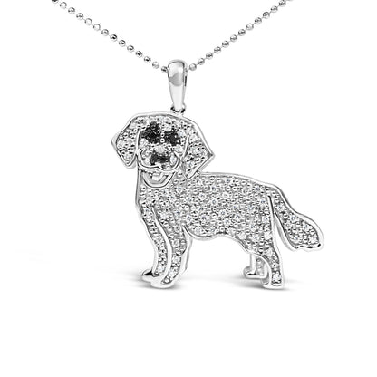Front-facing shot of a white metal dog-shaped necklace pendant adorned with white and black micro-pave set round gemstones.