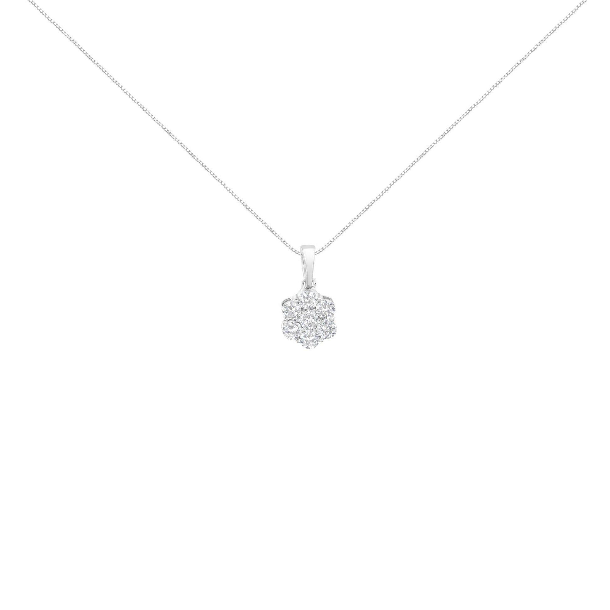 Front-facing shot of a white metal necklace with a flower-shaped pendant featuring round white gemstones in prong settings.