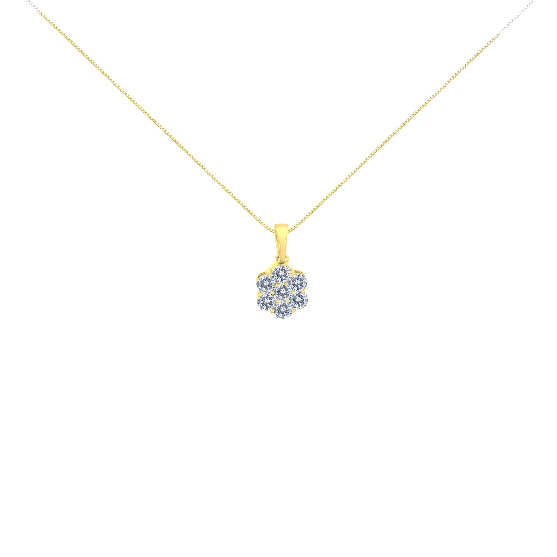 Front view of a yellow metal necklace with a pendant featuring seven round white gemstones in prong settings.