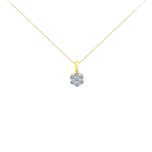 Front view of a yellow metal necklace with a pendant featuring seven round white gemstones in prong settings.