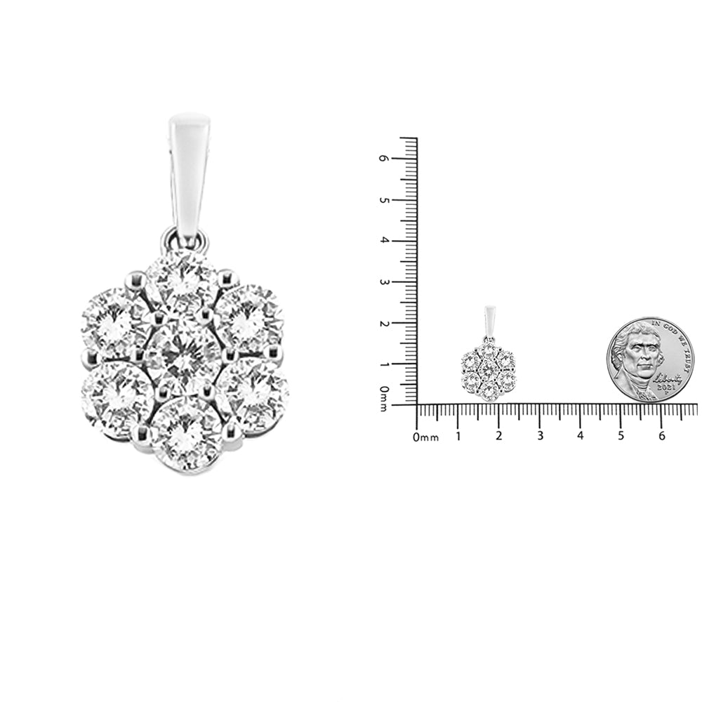 Front view of a white metal pendant necklace with round white gemstones in prong settings, shown next to a ruler and coin for size reference.