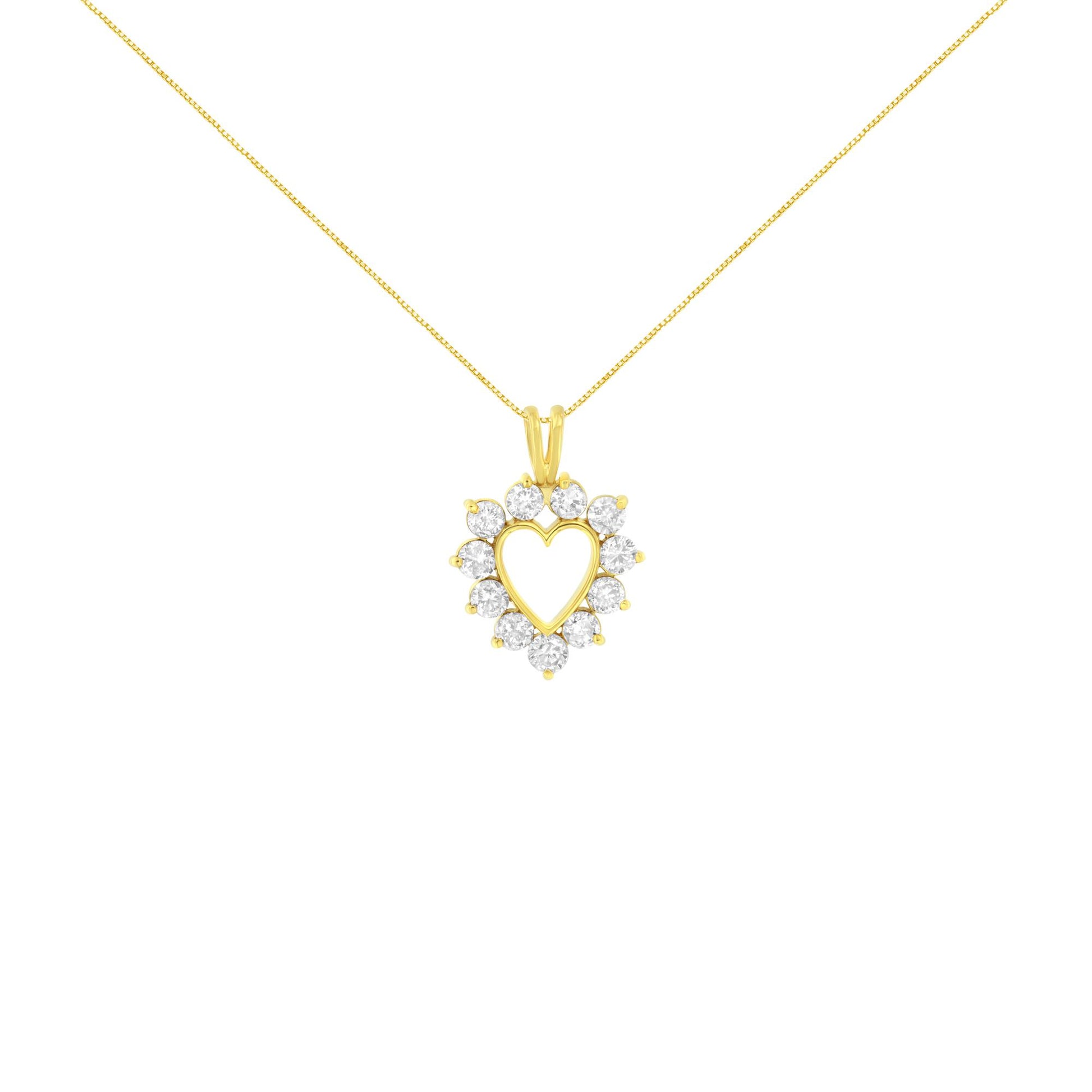 Front view of yellow necklace with heart-shaped pendant surrounded by round prong-set brownish gemstones.