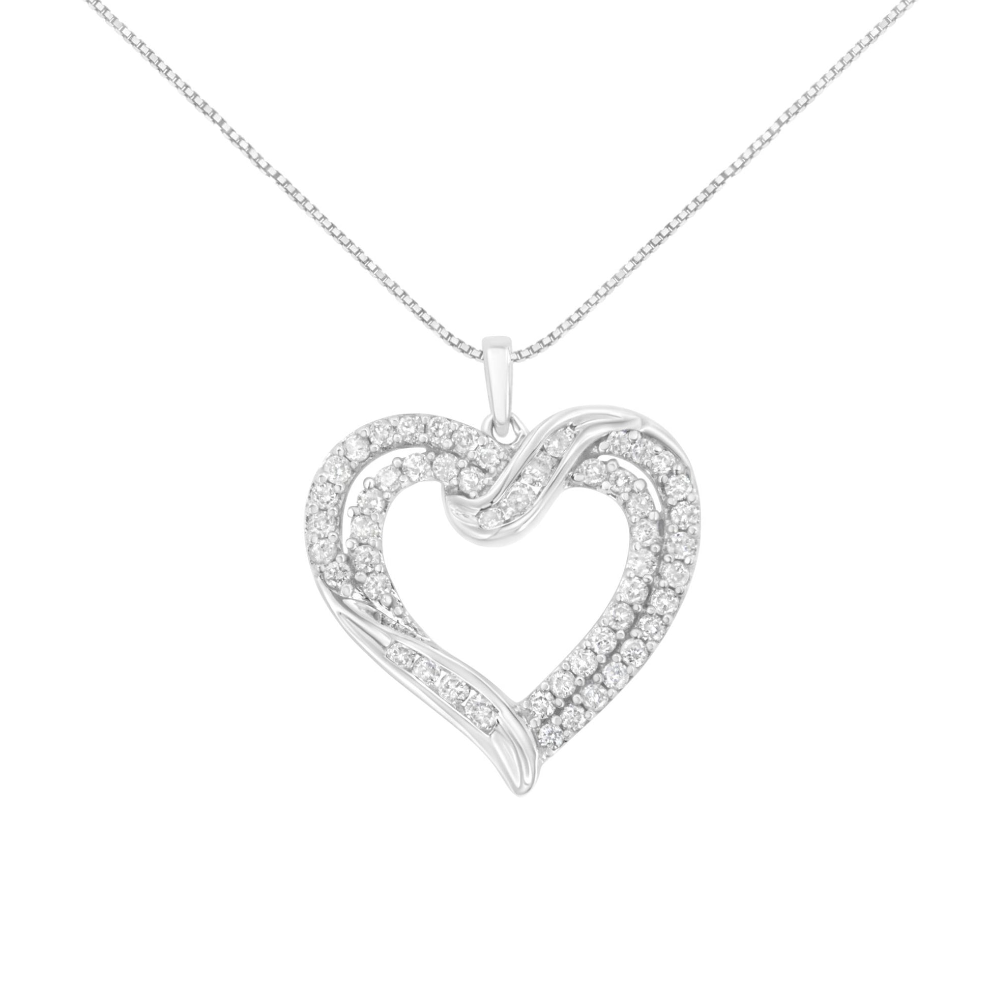 Front view of a white metal heart-shaped necklace pendant adorned with round white gemstones in prong settings along the design, hanging from a thin chain.