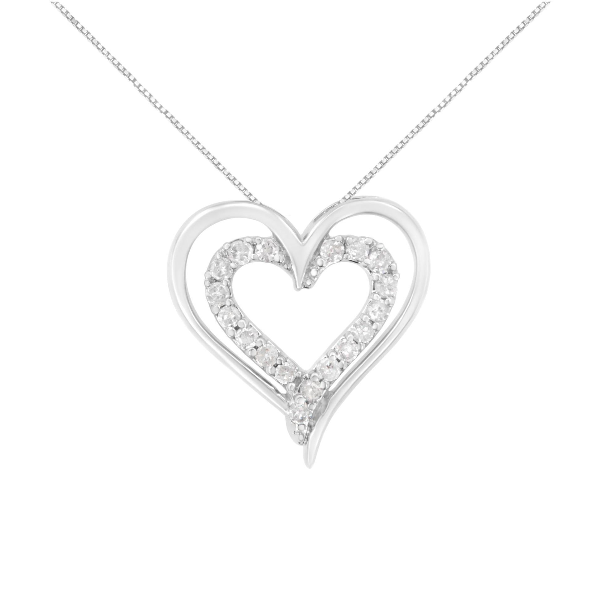 Front view of a white metal heart-shaped necklace pendant with inner heart outline set with round white gemstones in prong settings.