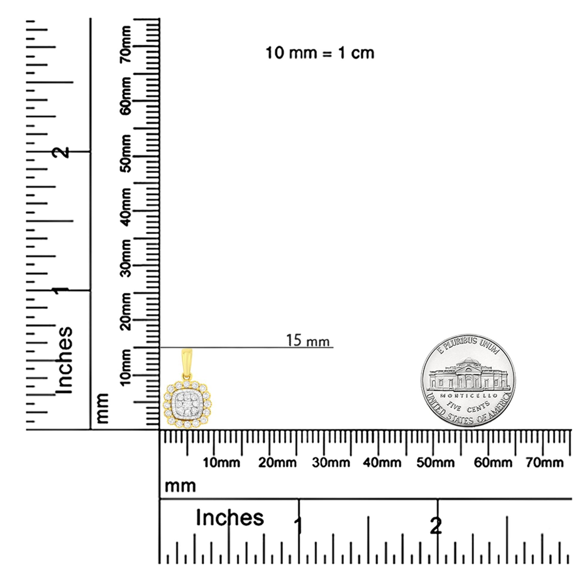 Yellow metal necklace pendant with round white gemstones in prong settings arranged in a cluster and surrounding design, shown on a ruler and coin for size reference, top-down angle.