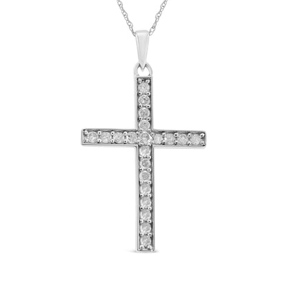 Front-facing view of a white metal cross necklace pendant with channel-set round white gemstones along the vertical and horizontal bars, suspended from a delicate chain.