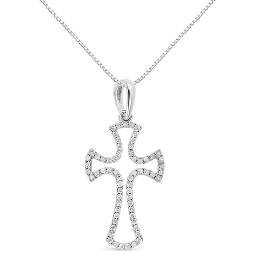 Front view of white metal necklace with cross-shaped pendant outlined with round white gemstones in a prong setting.