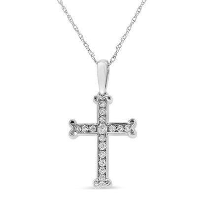 Front view of white necklace with cross pendant featuring round white gemstones in channel setting.