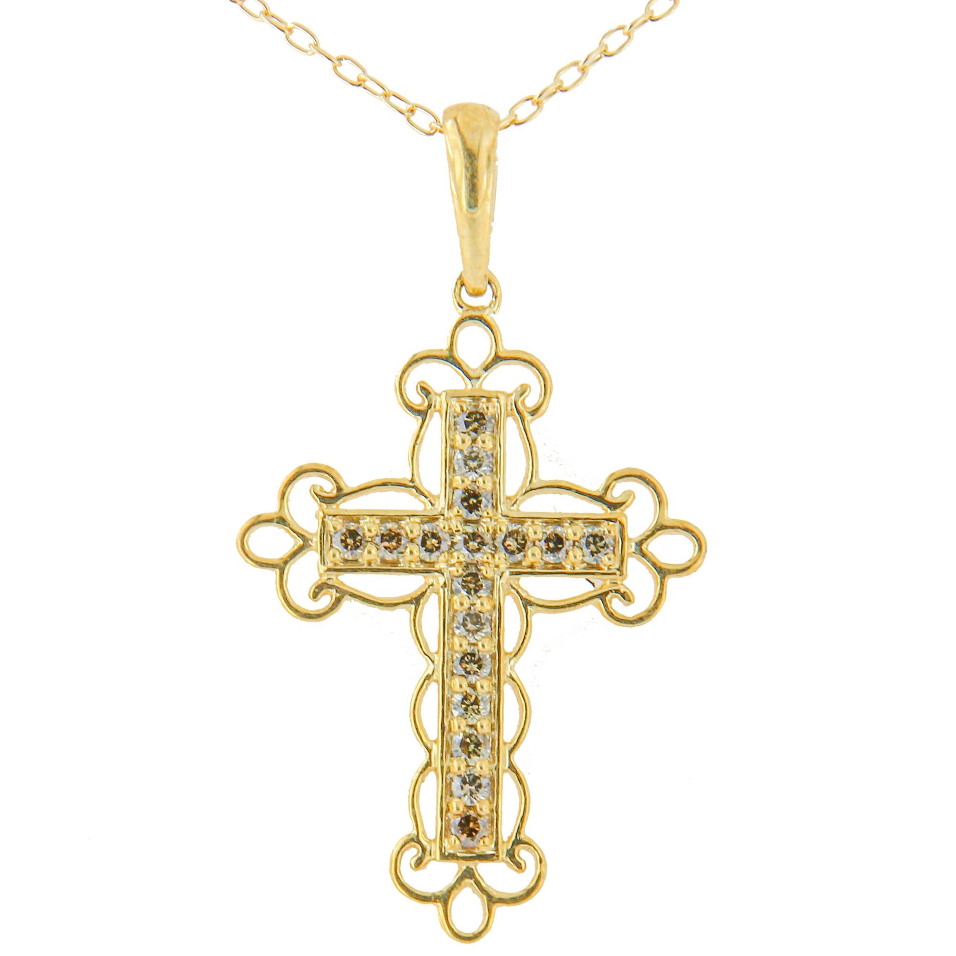 Front-facing shot of a yellow metal cross necklace pendant with round brownish prong-set gemstones arranged in a vertical and horizontal line, surrounded by ornate metalwork.
