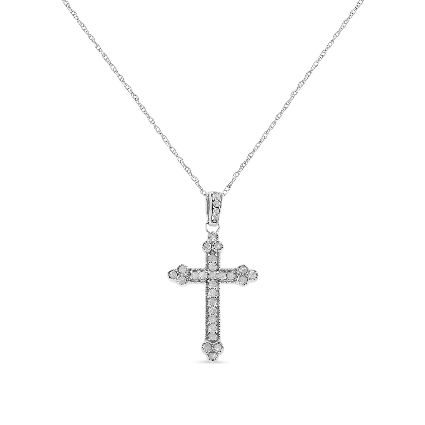Front view of a white metal cross pendant necklace with round white gemstones in prong settings along the cross and bail.