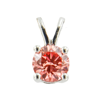 Close-up front view of a white metal necklace pendant with a single round pink gemstone in a prong setting.
