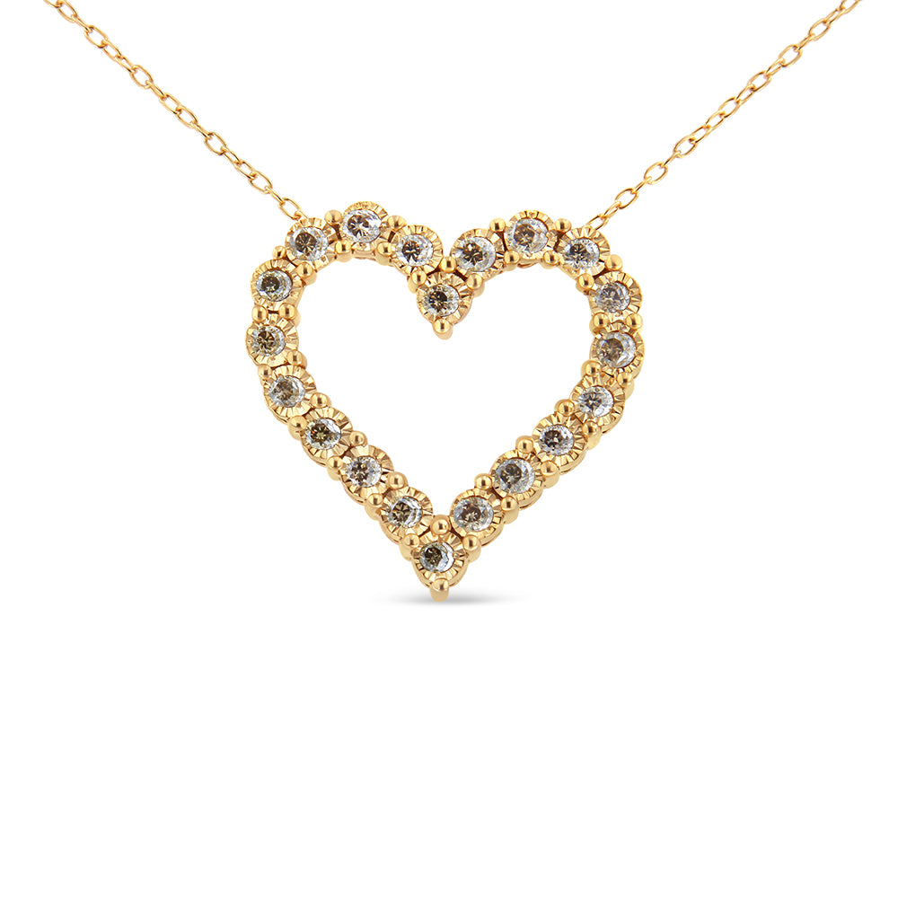 Front view of a yellow metal necklace with a heart-shaped pendant featuring round brownish gemstones in a miracle setting.