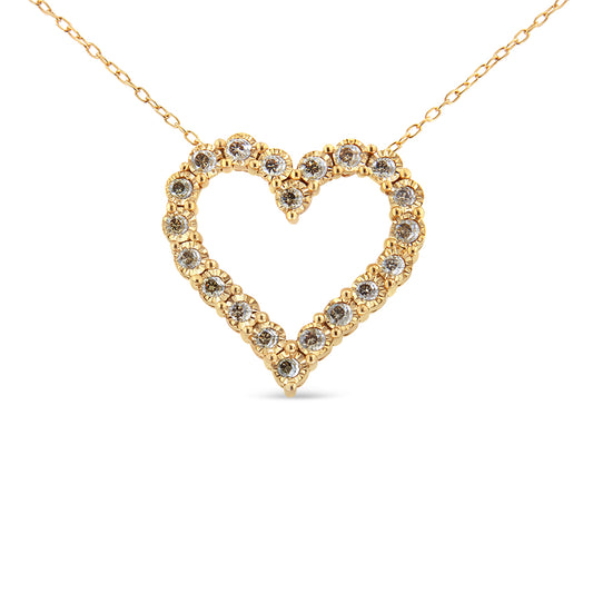 Front view of a yellow metal necklace with a heart-shaped pendant featuring round brownish gemstones in a miracle setting.