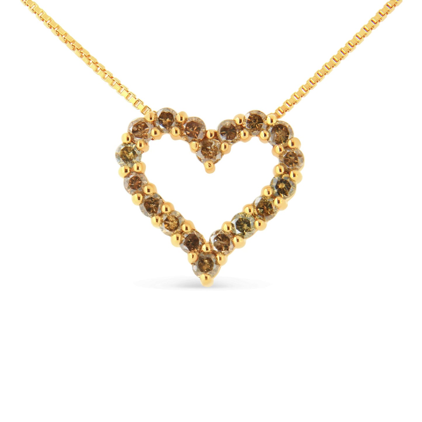 Yellow metal heart-shaped necklace pendant with round brownish gemstones in prong settings, front angle.