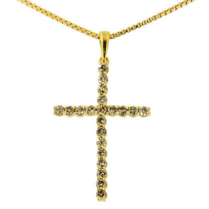 Front view of a yellow metal cross necklace pendant adorned with prong-set round brownish gemstones.