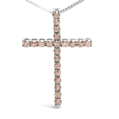 Front view of a white metal cross-shaped necklace pendant set with round champagne-colored gemstones in prong settings.