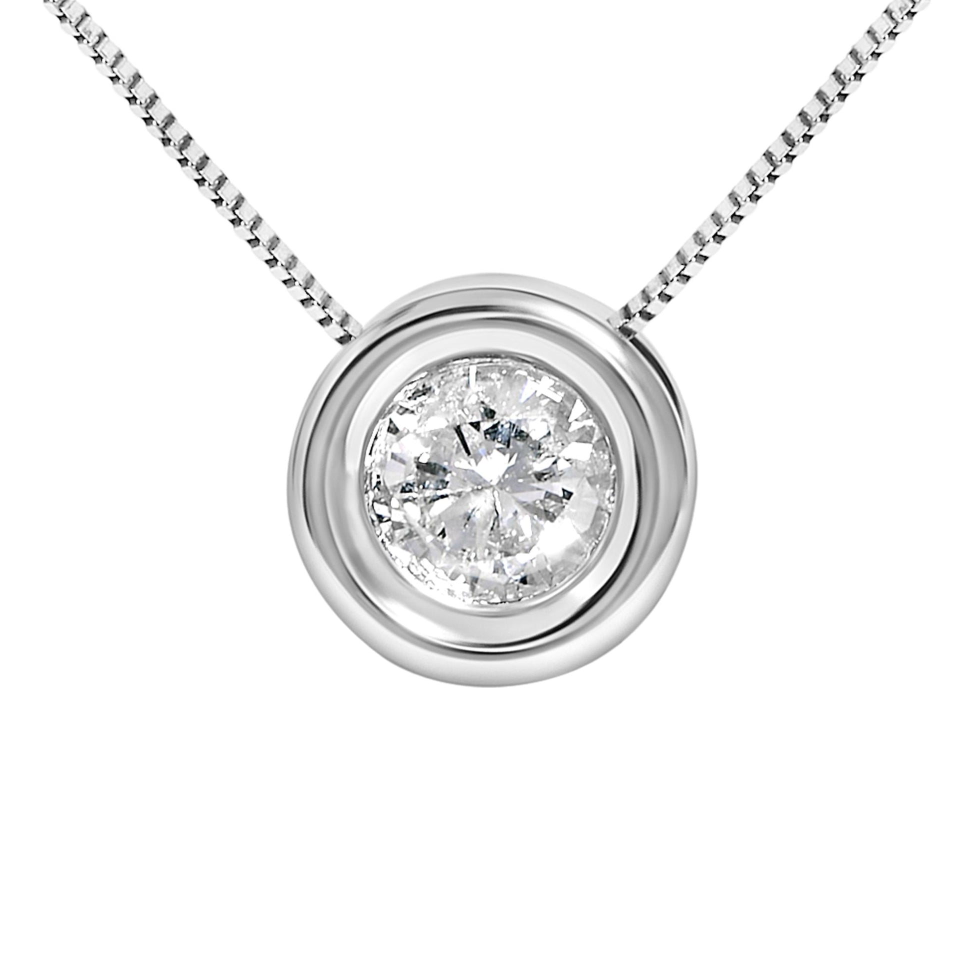 Close-up front view of a white necklace with a round white gemstone in a bezel setting pendant.