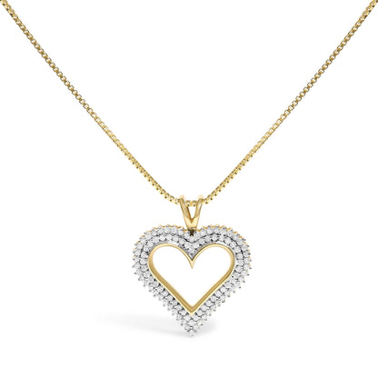 Front view of a yellow metal heart-shaped pendant necklace with white round gemstones set along the heart outline.