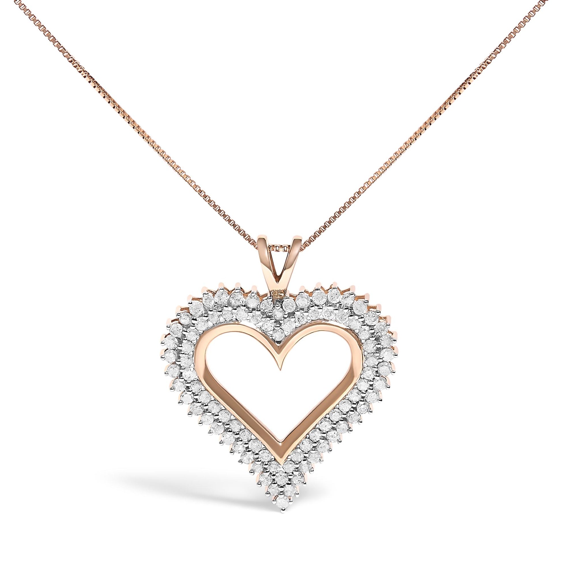 Front view of a rose metal heart-shaped necklace pendant outlined with white round gemstones in prong setting on a matching chain.