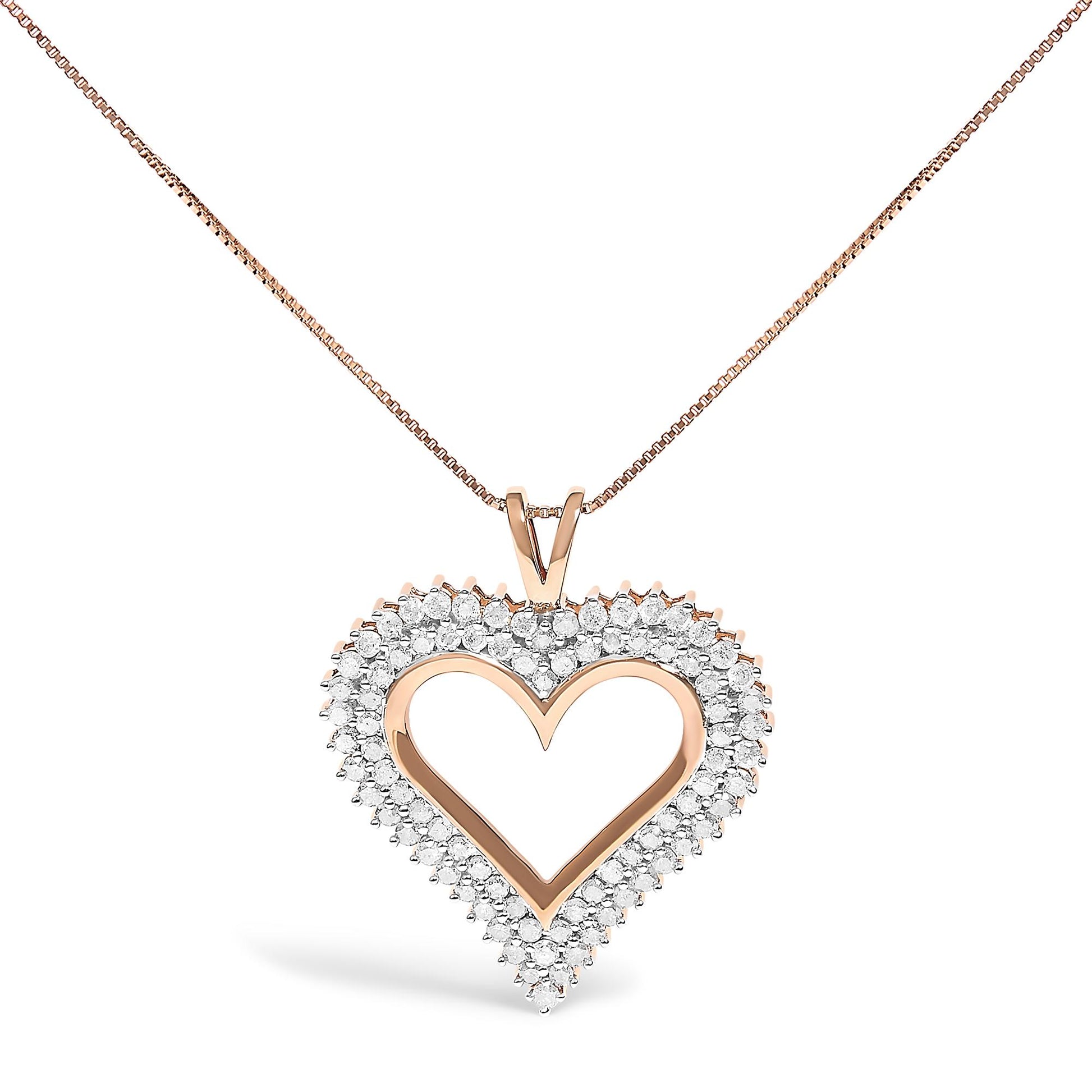 Front view of a rose-colored heart-shaped pendant necklace with a border of round white gemstones in prong settings.
