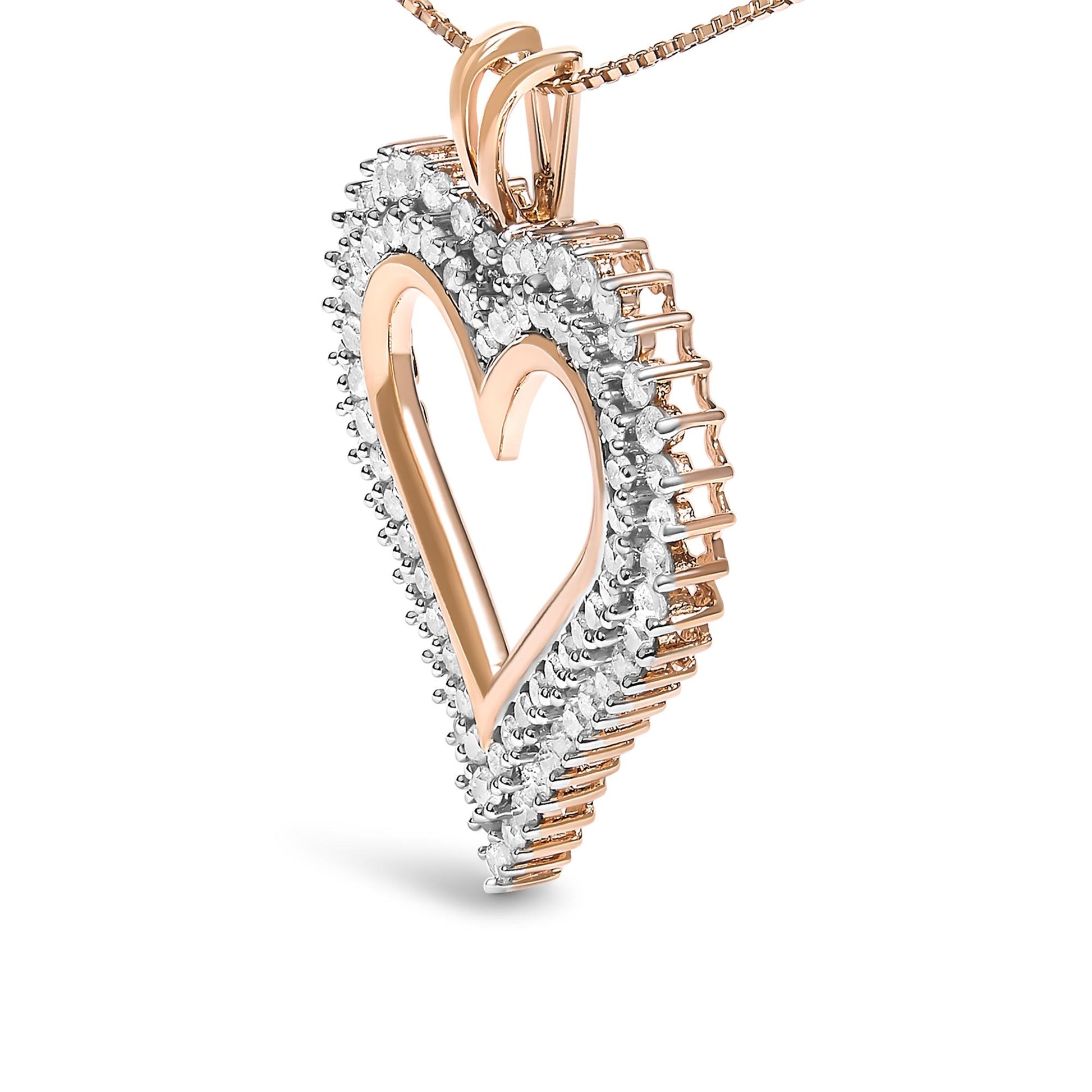 Close-up side angle view of a rose metal heart-shaped necklace pendant adorned with prong-set white round gemstones around the edges.