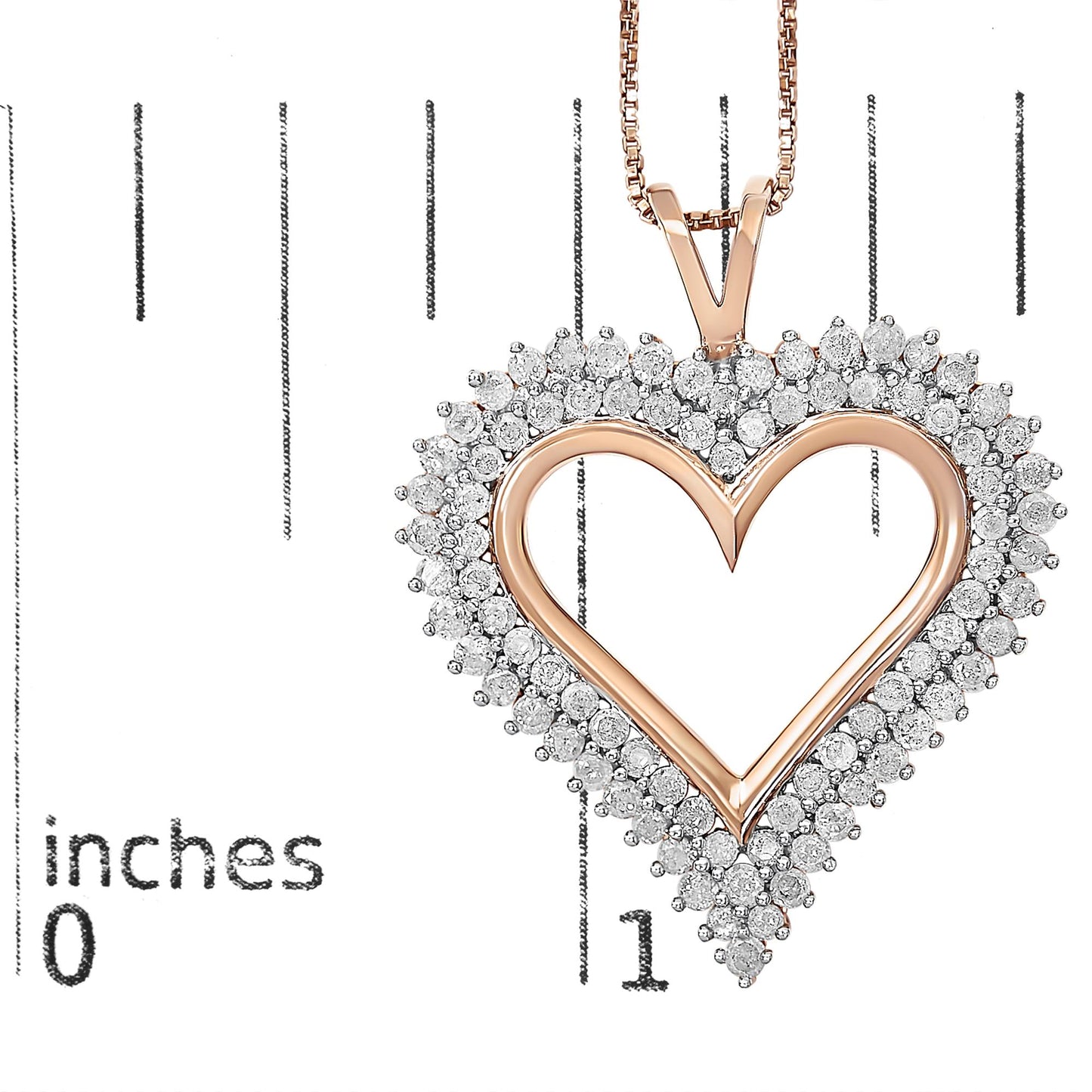 Close-up front view of a rose-colored heart-shaped necklace pendant surrounded by two rows of prong-set round white gemstones, placed on a ruler for size reference.
