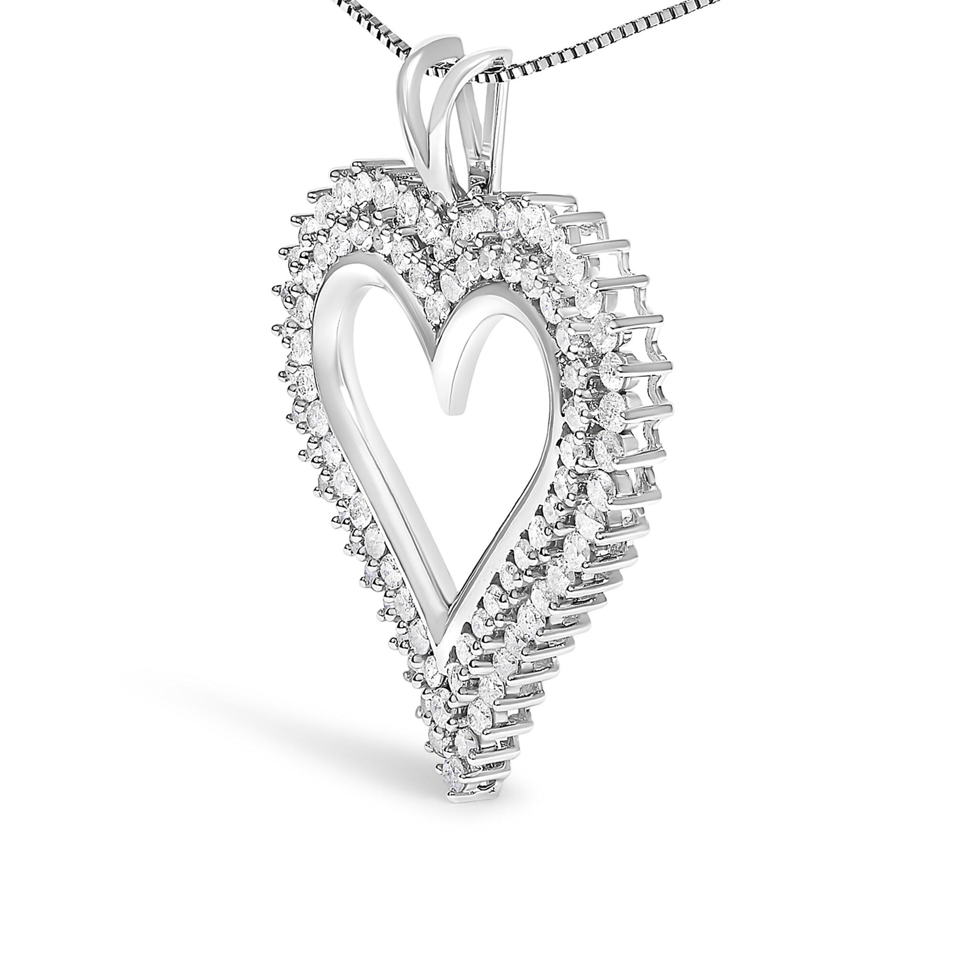 White metal heart-shaped necklace pendant with round white gemstones in a prong setting, shown in a close-up angled side view.