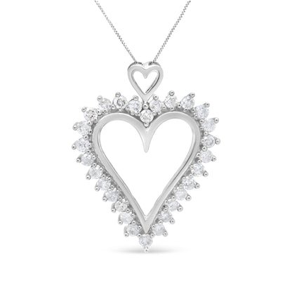 Front view of a white metal heart-shaped necklace pendant outlined with round white gemstones in prong settings.