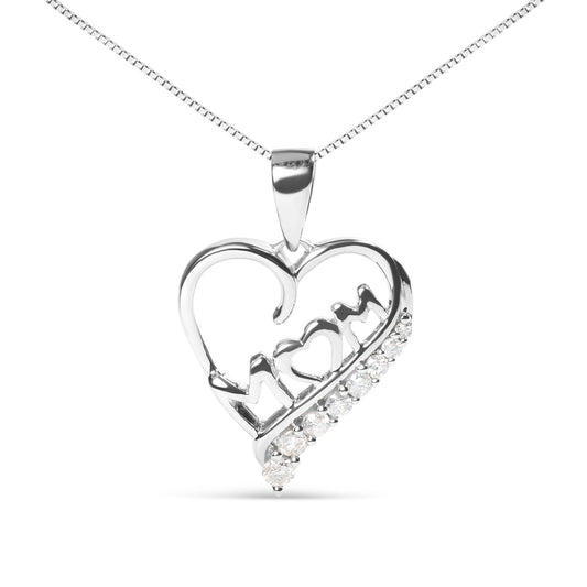 Front-facing view of white metal heart-shaped necklace pendant with the word 'MOM' inside, featuring round white gemstones in prong settings along one side and within the design.